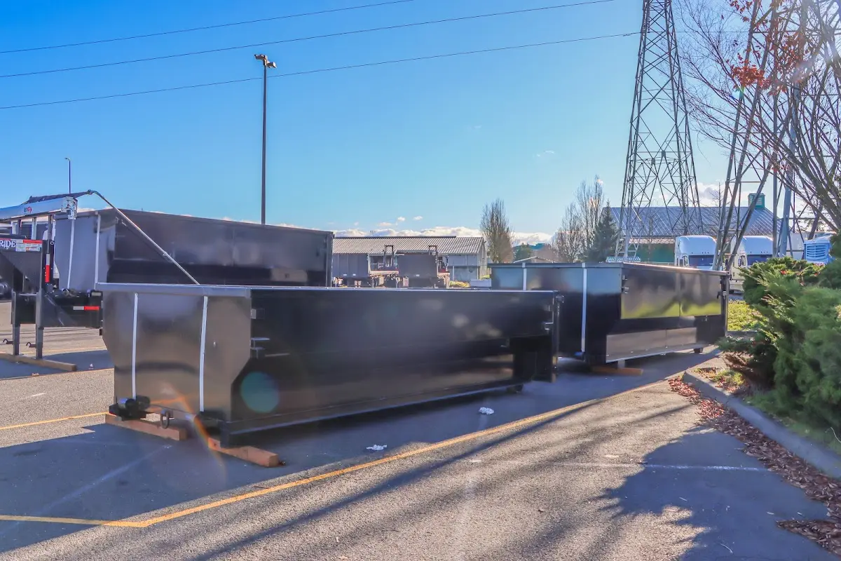 Roll-off dumpster ready for waste disposal at job site for 4 Yard Dumpster Rental in Linwood